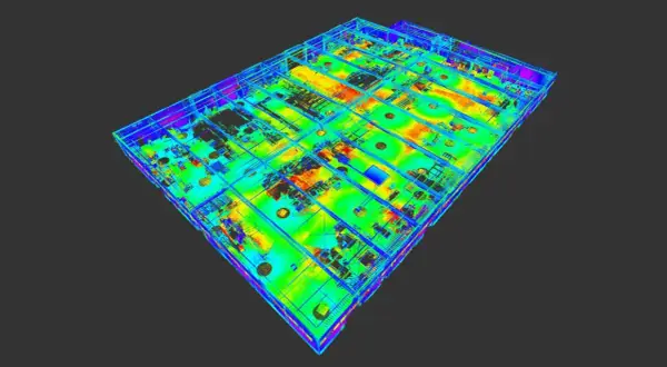 Trójwymiarowy model hali produkcyjnej z zaznaczonymi strefami. Kolory wskazują na różne parametry, np. temperaturę lub natężenie światła.