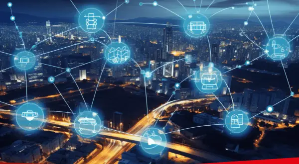 Sieć połączonych ikon symbolizuje smart grid, integrujący infrastrukturę miejską i przemysłową.